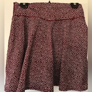 BuffBunny succulent skort. NWOT, dark vineyard bossy print